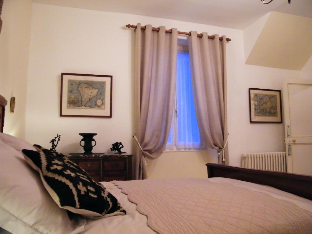 Voodi või voodid majutusasutuse Villa des Capucins toas