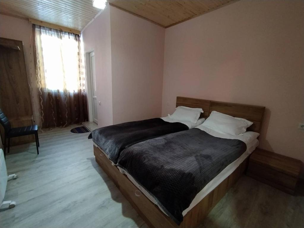 Postel nebo postele na pokoji v ubytování Tetne Qor Guesthouse