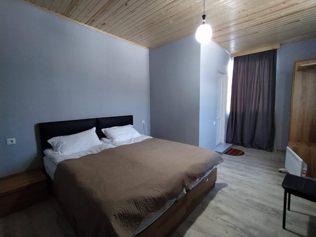 Postel nebo postele na pokoji v ubytování Tetne Qor Guesthouse