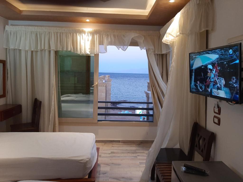 TV a/nebo společenská místnost v ubytování Diamond Dahab House