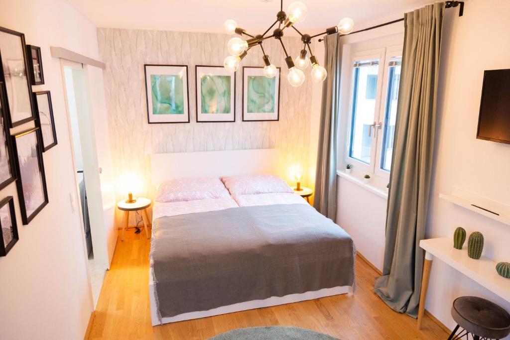 Postel nebo postele na pokoji v ubytování Green & cozy apartment - 15 min to city center