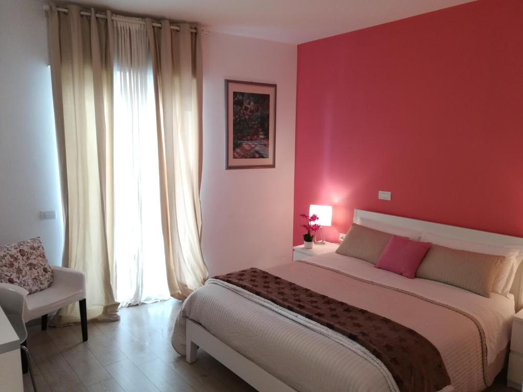 Postel nebo postele na pokoji v ubytování Dimora Francesca