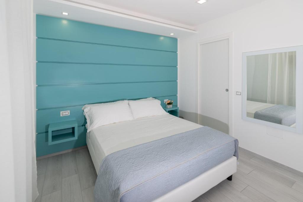 Postel nebo postele na pokoji v ubytování Dreams Tropea Mare "Parking Private"