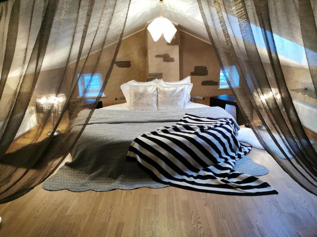 
Cama o camas de una habitación en OldHouse Apartments - Tallinn Old Town
