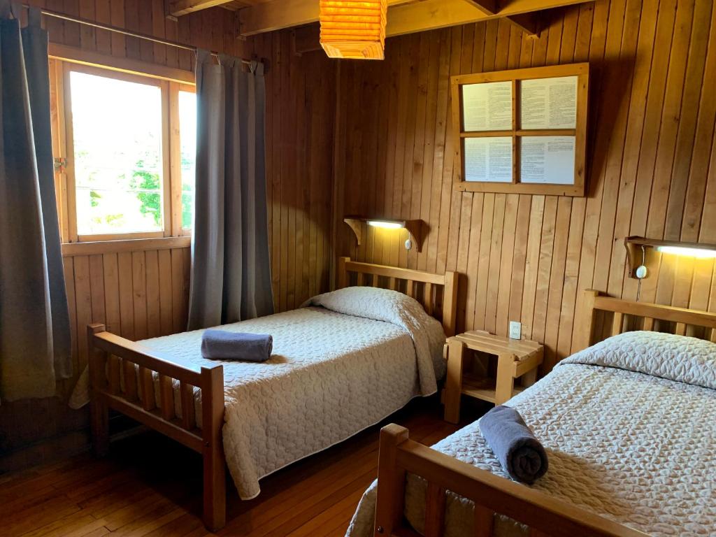 Postel nebo postele na pokoji v ubytování Casa Azul Hostel