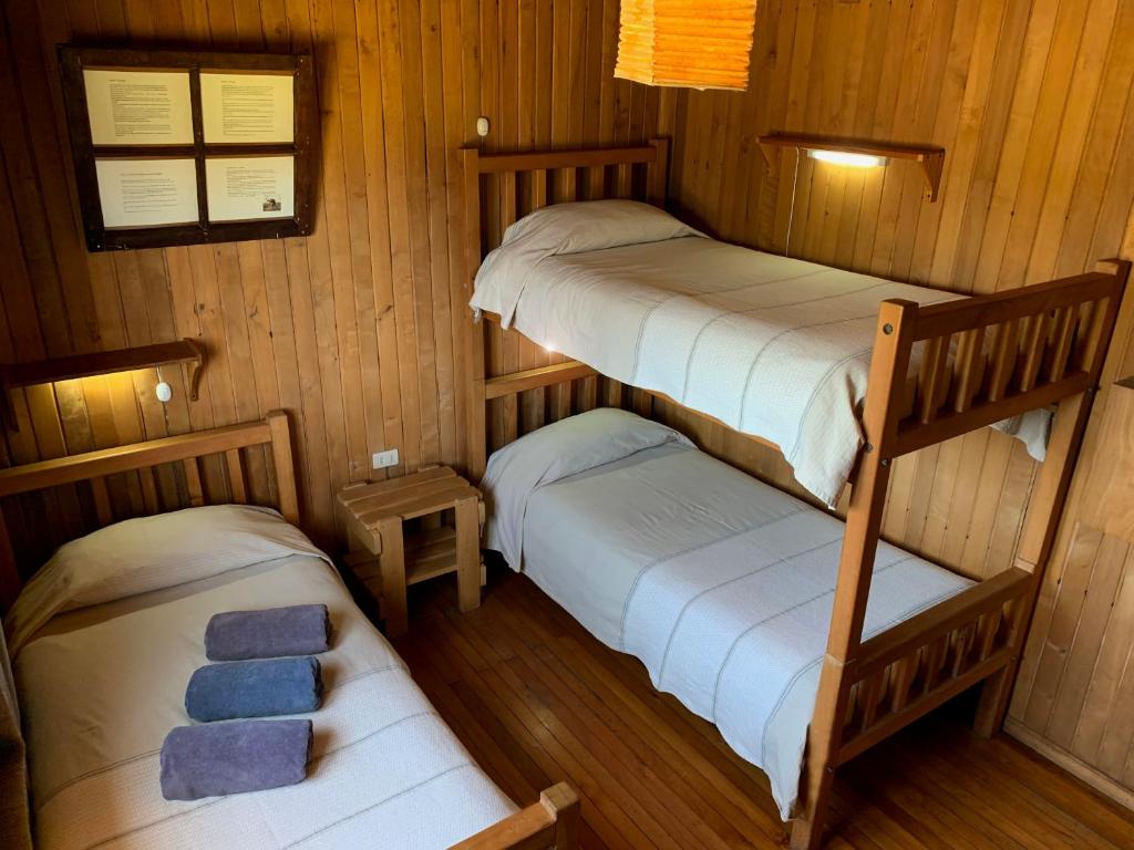 Postel nebo postele na pokoji v ubytování Casa Azul Hostel
