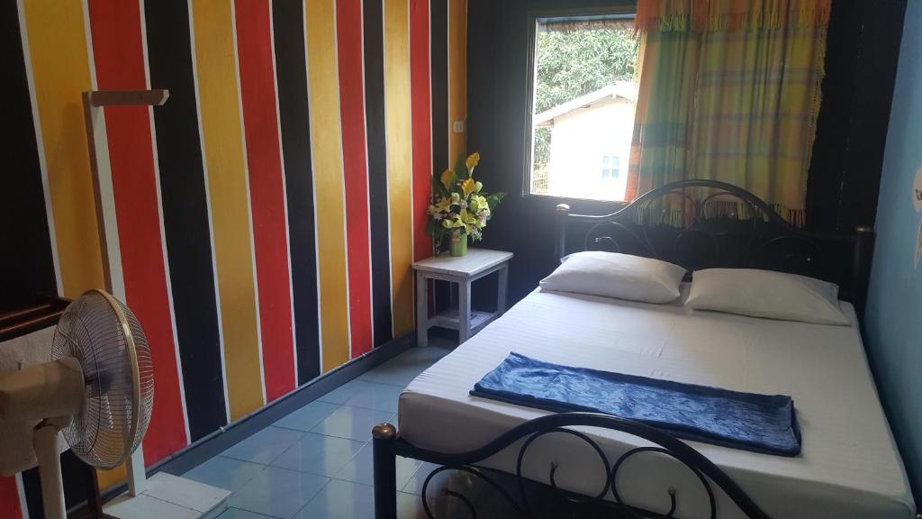 Postel nebo postele na pokoji v ubytování Mr. Clean Guesthouse