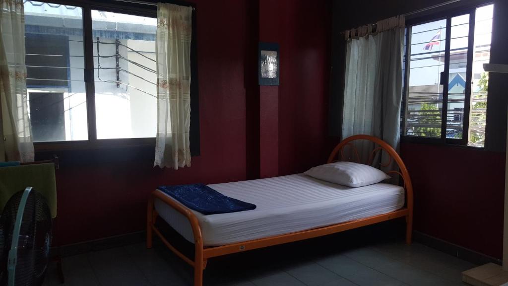 Postel nebo postele na pokoji v ubytování Mr. Clean Guesthouse