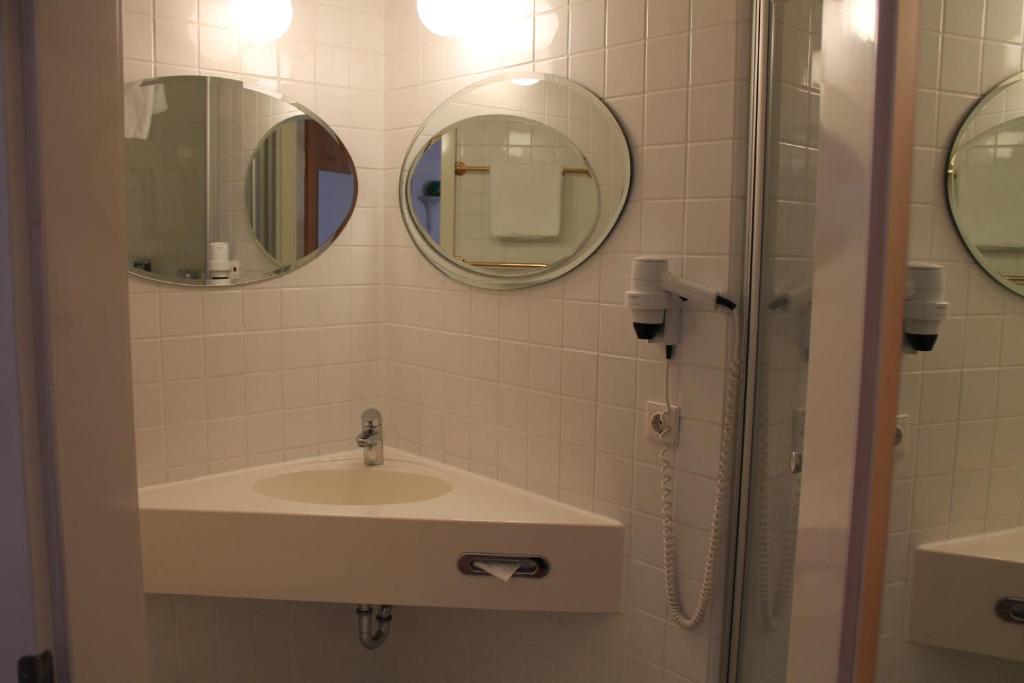 Koupelna v ubytování Art-Hotel Robert Mayer