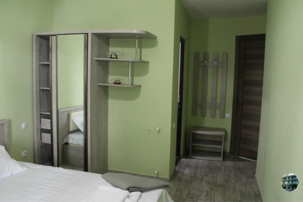 Postel nebo postele na pokoji v ubytování Shekvetili Green House