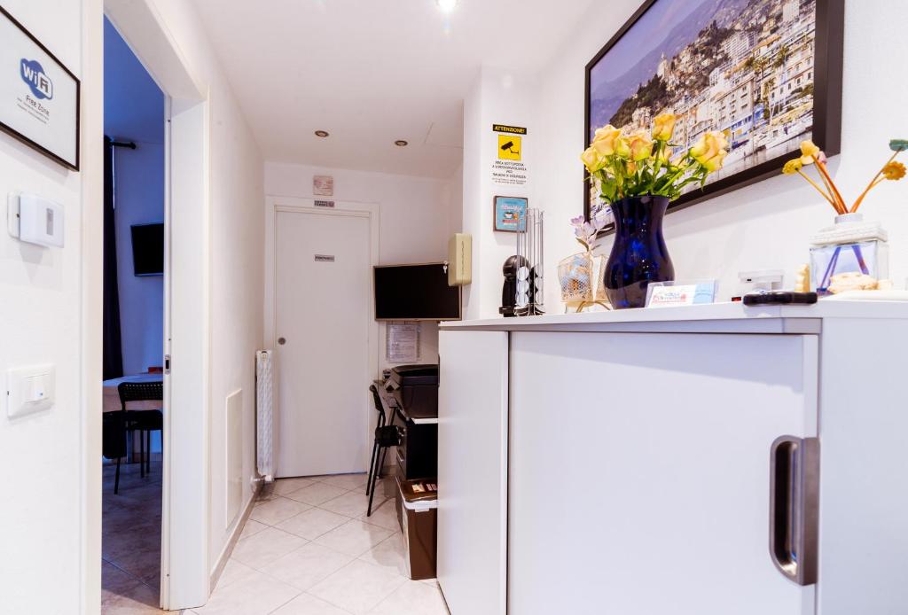 Televízia a/alebo spoločenská miestnosť v ubytovaní "6 in centro" guest house