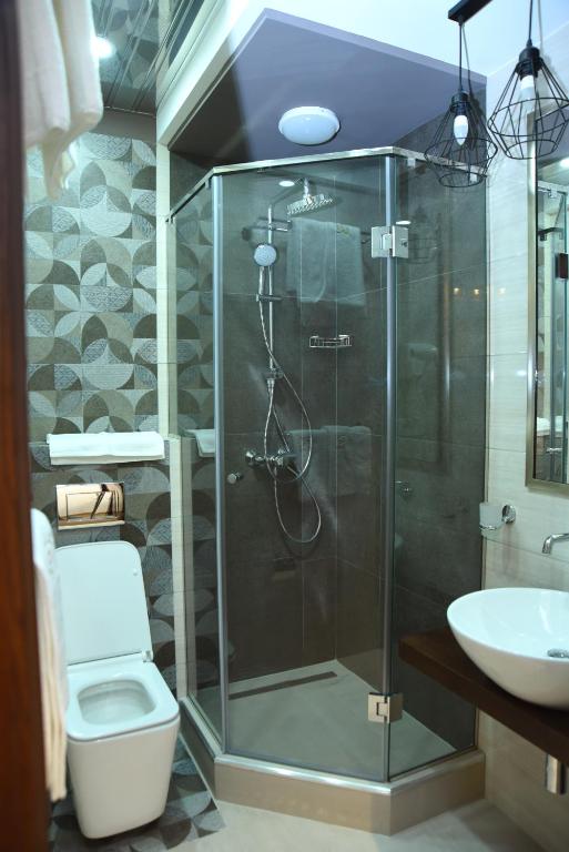 Koupelna v ubytování R&R Hotel