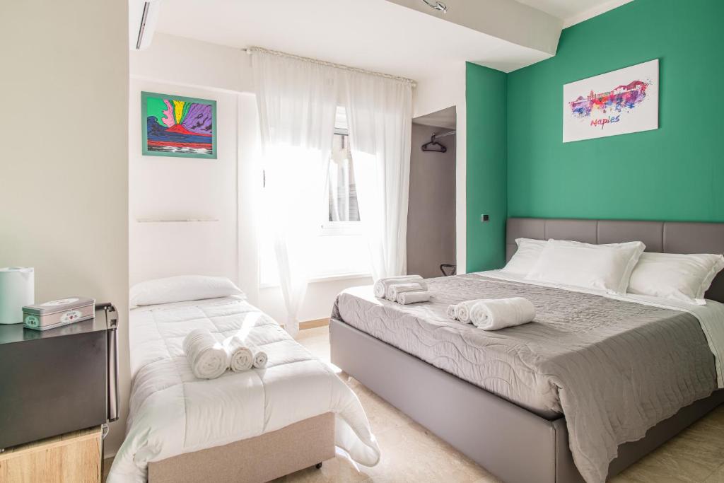 Posteľ alebo postele v izbe v ubytovaní Borgo Santa Lucia B&B