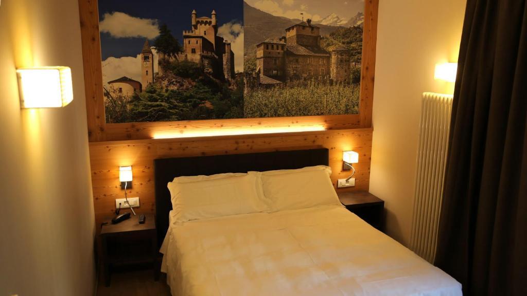 Postel nebo postele na pokoji v ubytování Dada Mountain Hotel