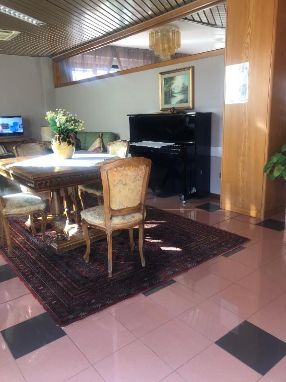 Posezení v ubytování Albergo Casa dell'Ospite