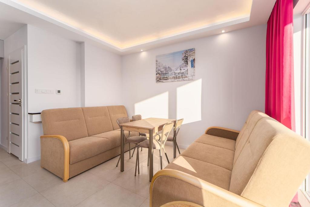 Posedenie v ubytovaní Apartamenty Flamingo by Noclegi Renters