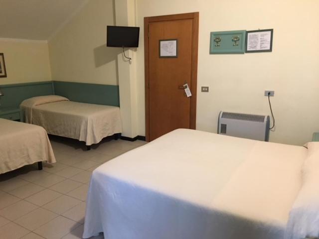 a hospital room with a bed and a desk at Albergo Marina in Sestri Levante