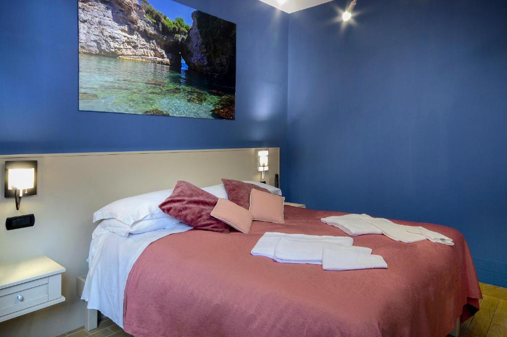 Postel nebo postele na pokoji v ubytování B&B Sorrento Queen