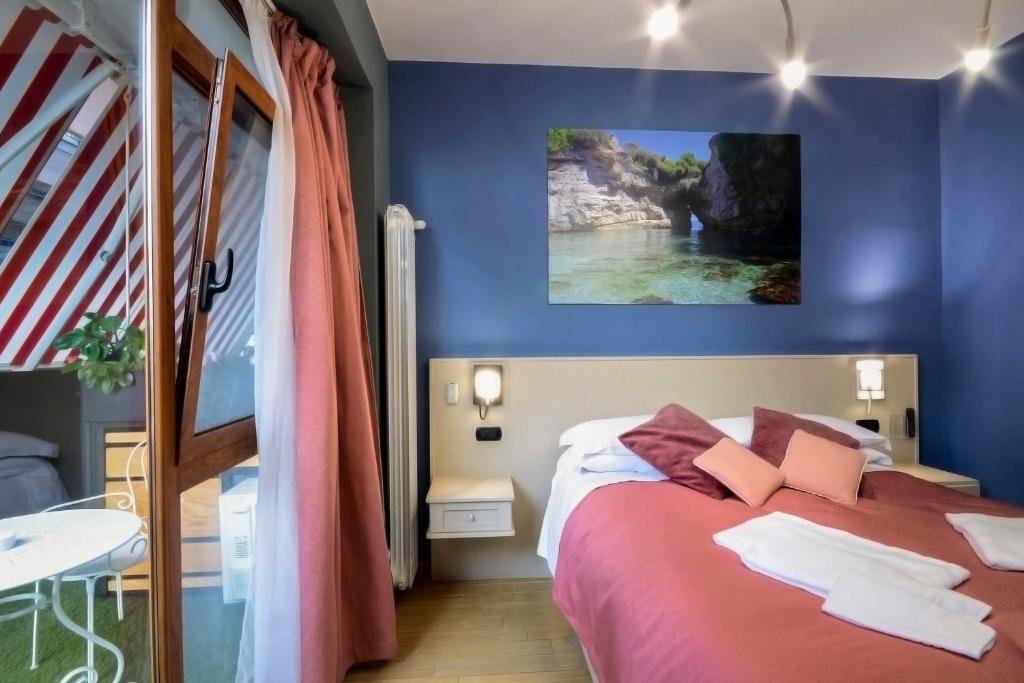 Postel nebo postele na pokoji v ubytování B&B Sorrento Queen
