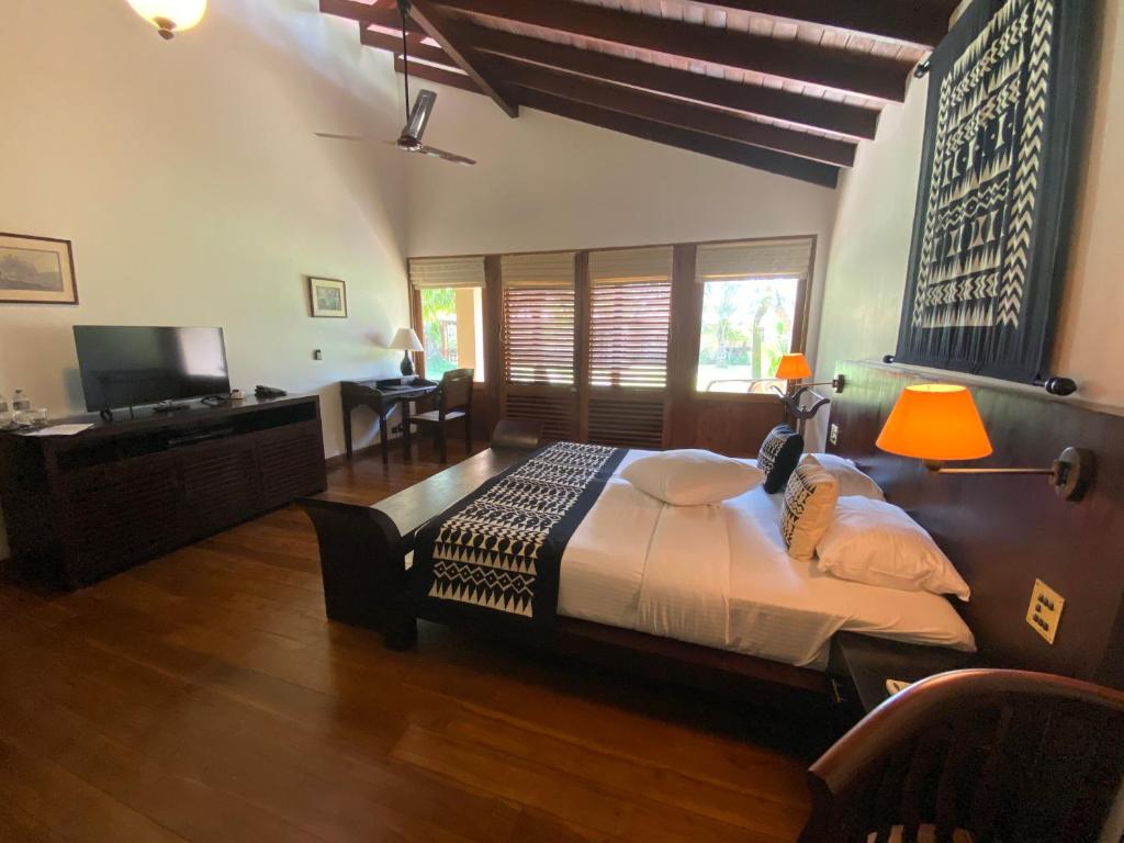 Postel nebo postele na pokoji v ubytování Weligama Bay Resort