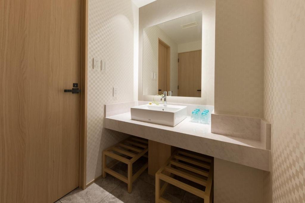 Koupelna v ubytování IAM HOTEL