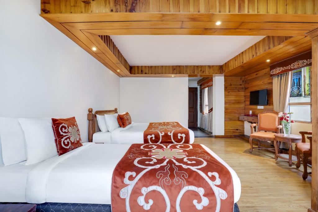 Postel nebo postele na pokoji v ubytování Summit Hermon Hotel & Spa