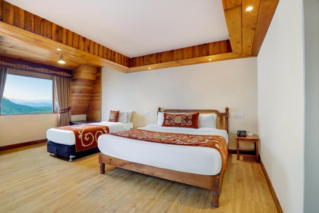 Postel nebo postele na pokoji v ubytování Summit Hermon Hotel & Spa