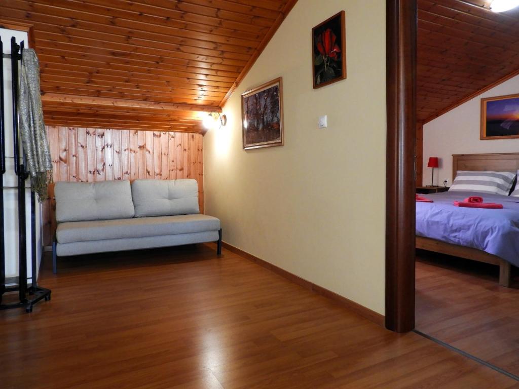 A bed or beds in a room at PanoramaLoft - quality, view, sea & mountain