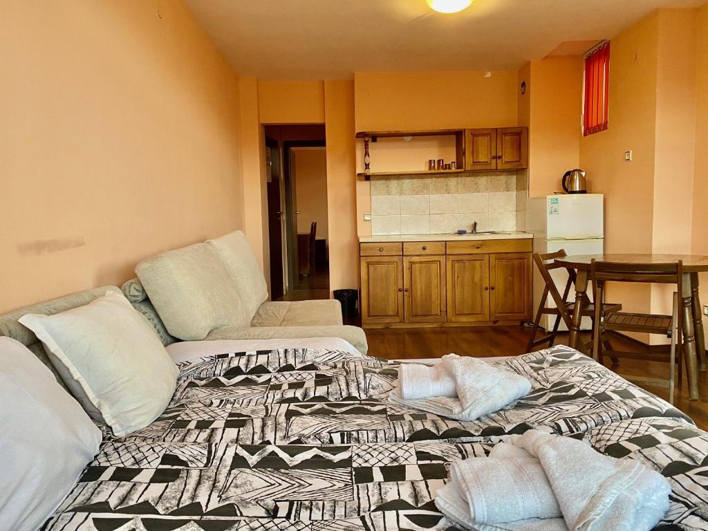 Postel nebo postele na pokoji v ubytování Family Hotel Carpe Diem