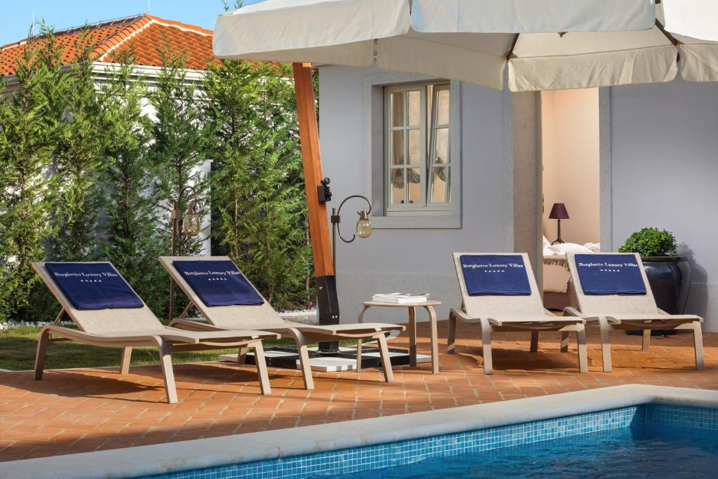 Bazén v ubytování Villa Celeste by Villas Borghetto nebo v jeho okolí