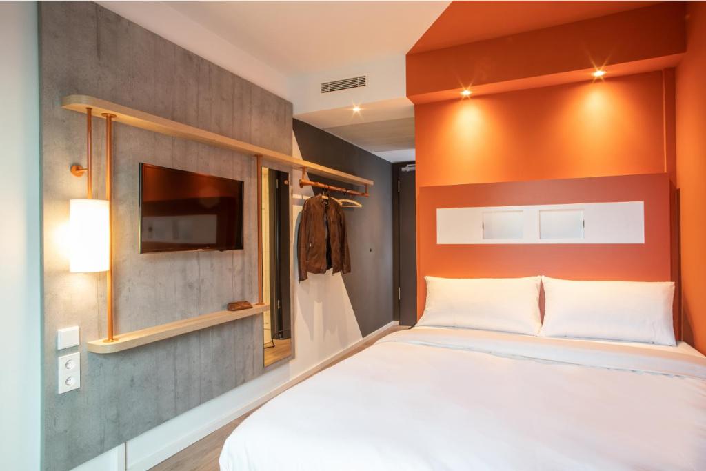 Postel nebo postele na pokoji v ubytování ibis budget Bayreuth