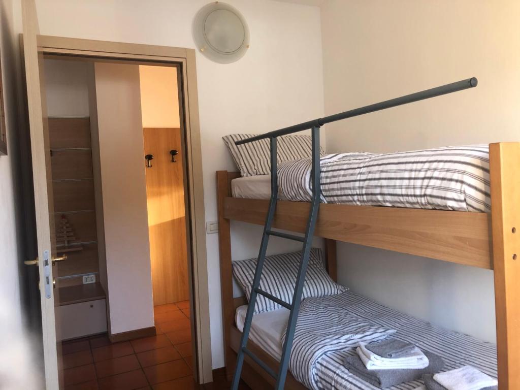 Postel nebo postele na pokoji v ubytování Appartamenti Al Ploz