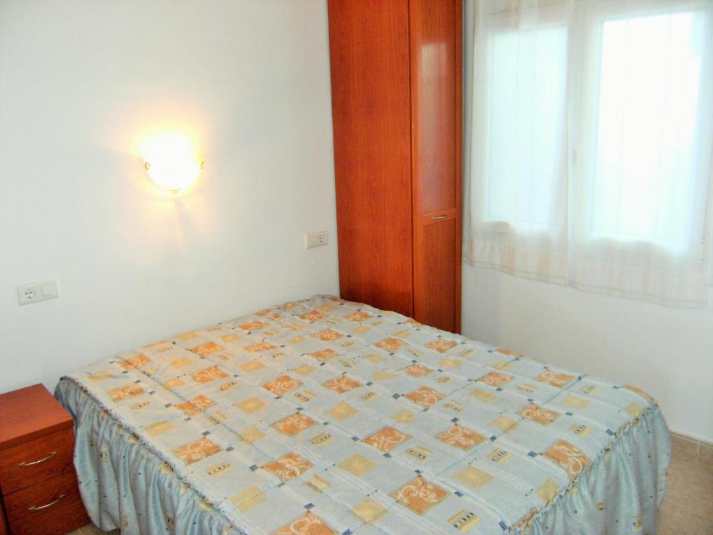 A bed or beds in a room at Rocamaura I B 6-1
