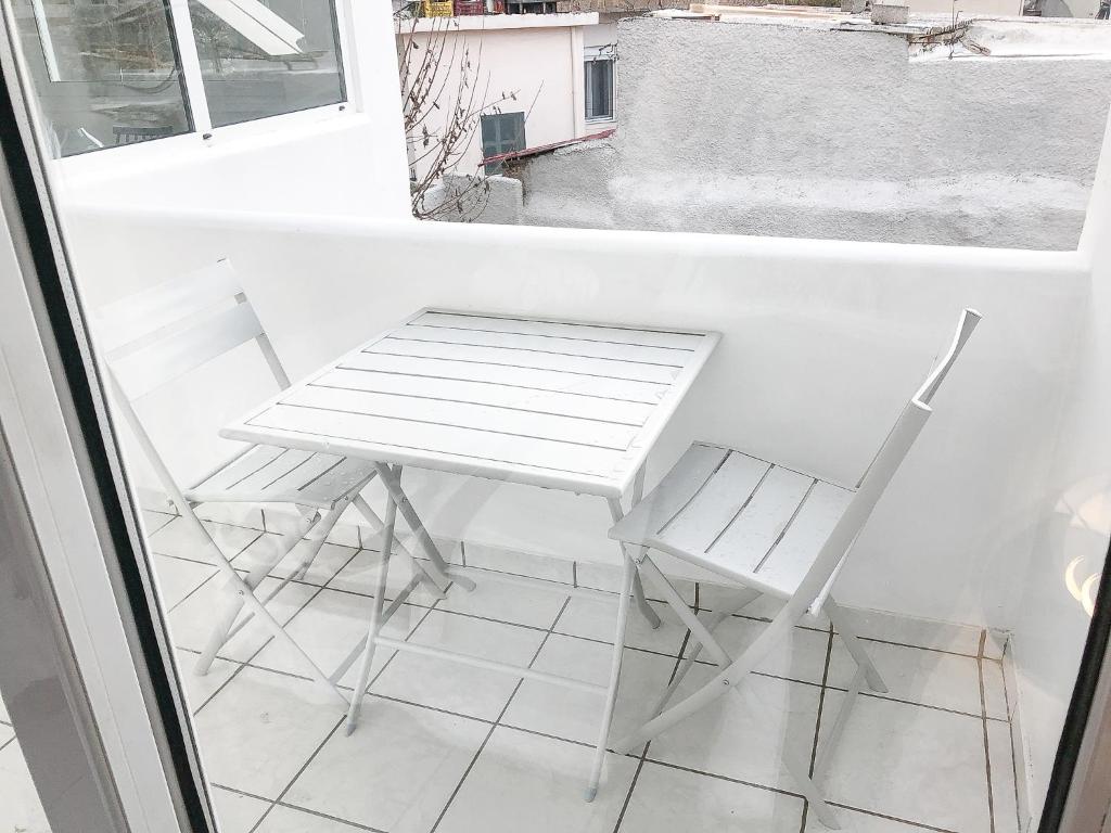 A balcony or terrace at Sofia City Beach 3 Apts Nea Chora Chania steps from the beach