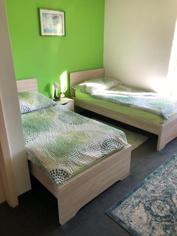 Postel nebo postele na pokoji v ubytování Le Bras d'Or