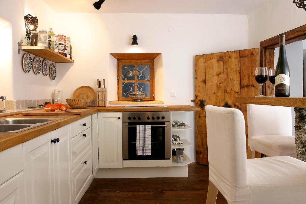 Kuchyň nebo kuchyňský kout v ubytování Chalet Hinterbreiteneben