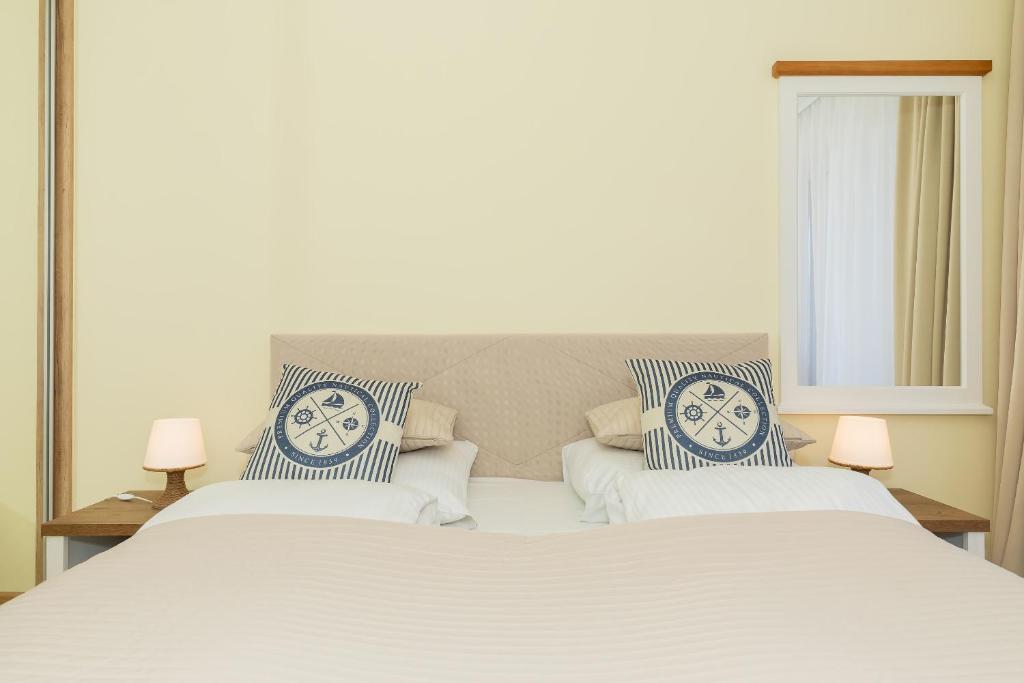 Posteľ alebo postele v izbe v ubytovaní Jantar Apartamenty Exclusive Polanki Park SPA