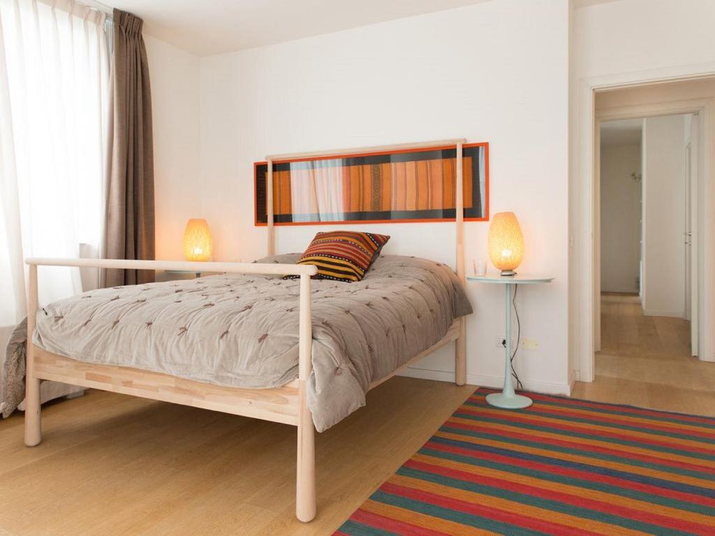 A bed or beds in a room at ATTICO DELLA LATTA
