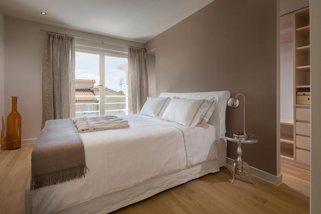 Postel nebo postele na pokoji v ubytování Villa Medea by HMZ Villas
