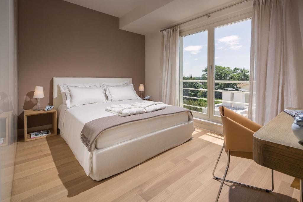 Postel nebo postele na pokoji v ubytování Villa Medea by HMZ Villas