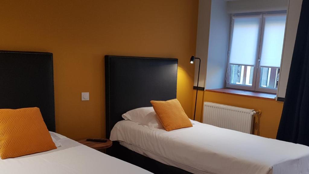 Postel nebo postele na pokoji v ubytování Le Beaugency