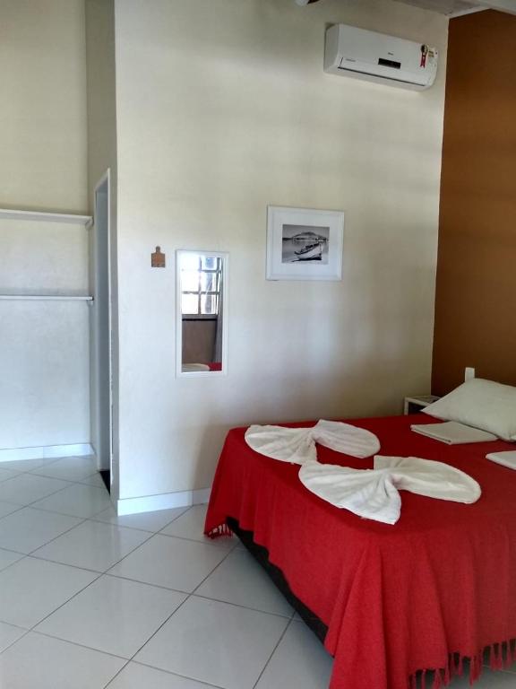 Postel nebo postele na pokoji v ubytování Pousada Ilha do Meio