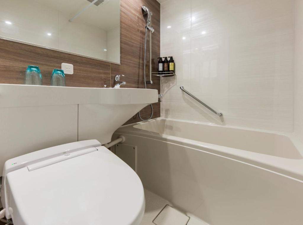 Koupelna v ubytování IAM HOTEL