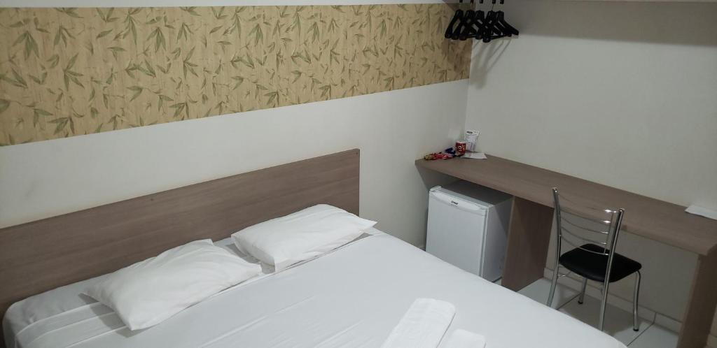 Postel nebo postele na pokoji v ubytování Hotel LG