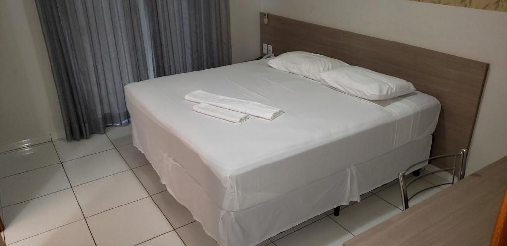 Postel nebo postele na pokoji v ubytování Hotel LG