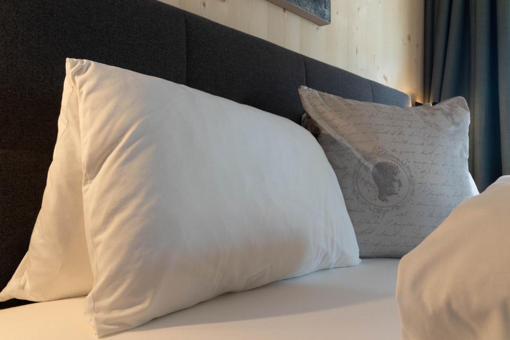 Ein Bett oder Betten in einem Zimmer der Unterkunft Wally Berg-Appartements