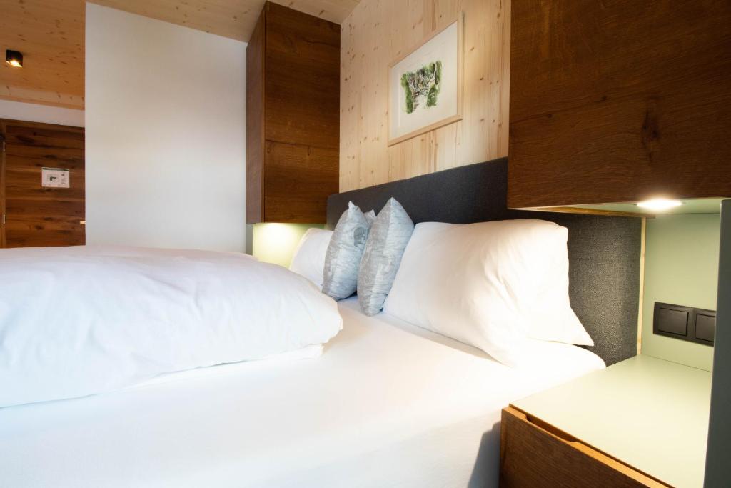 Ein Bett oder Betten in einem Zimmer der Unterkunft Wally Berg-Appartements