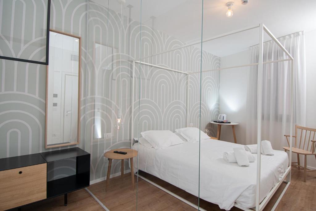 Postel nebo postele na pokoji v ubytování Hotel Rio