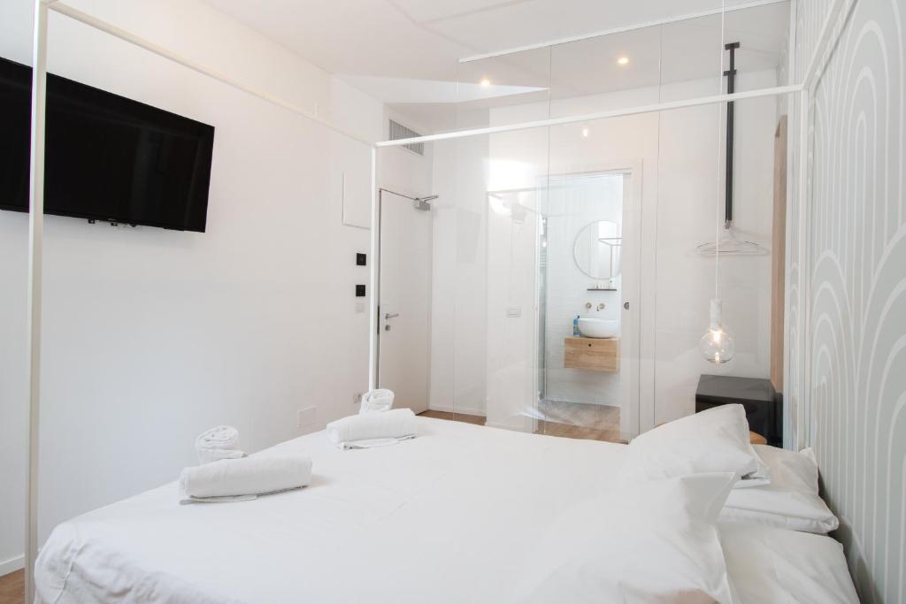 Postel nebo postele na pokoji v ubytování Hotel Rio