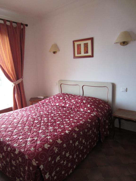 Letto o letti in una camera di Hotel Belle Vue